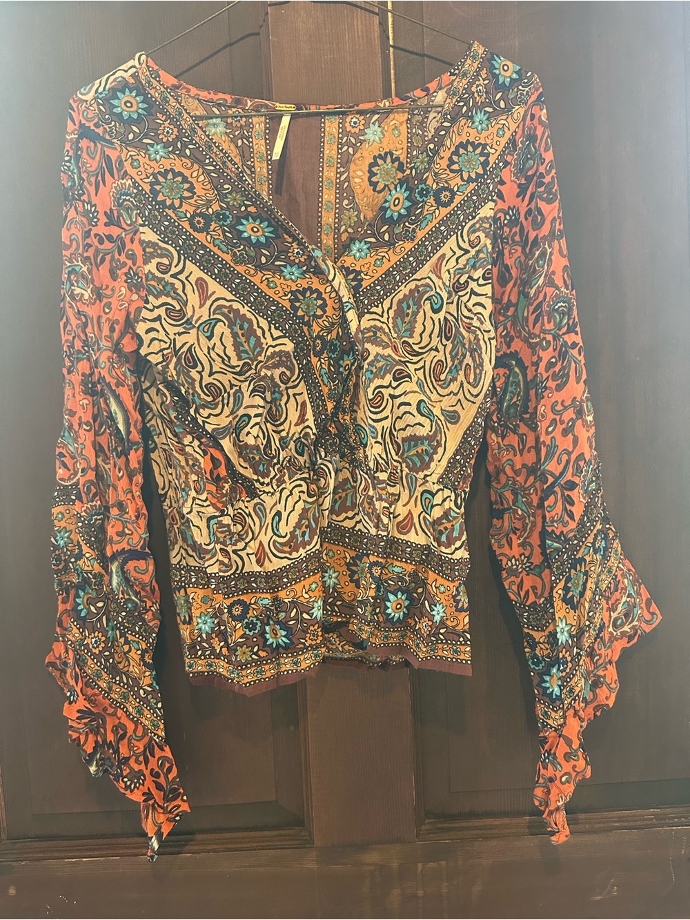 Free People Paisley Print V-Neck Blouse in Rust and Teal